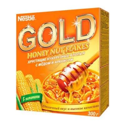 Готовый завтрак Nestle Gold Кукурузные Хлопья с медом и арахисом 300 гр., картон